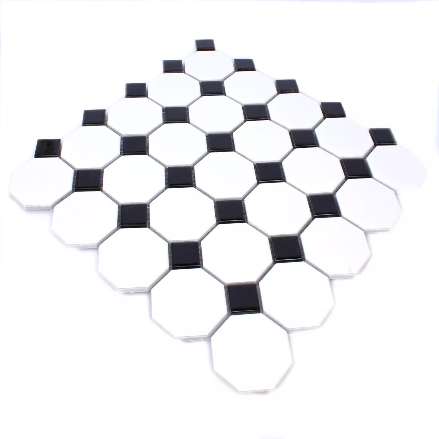 Muster von Mosaikfliesen Keramik Octagon Belami Schwarz Weiss
